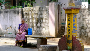 Women sitting in urban public space, representing safer cities and gender-responsive urban governance.