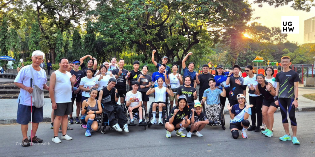 People with and without disabilities participate together in a community physical activity event in a public park.