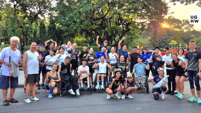 People with and without disabilities participate together in a community physical activity event in a public park.