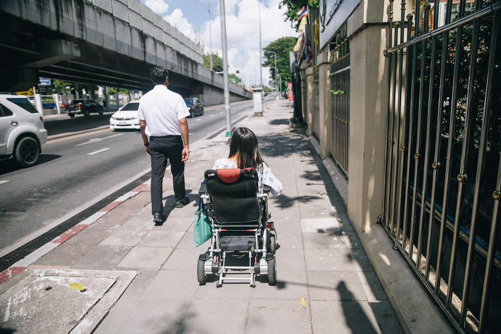 People with disabilities and non-disabled people play sports together in an inclusive community recreation programme.
